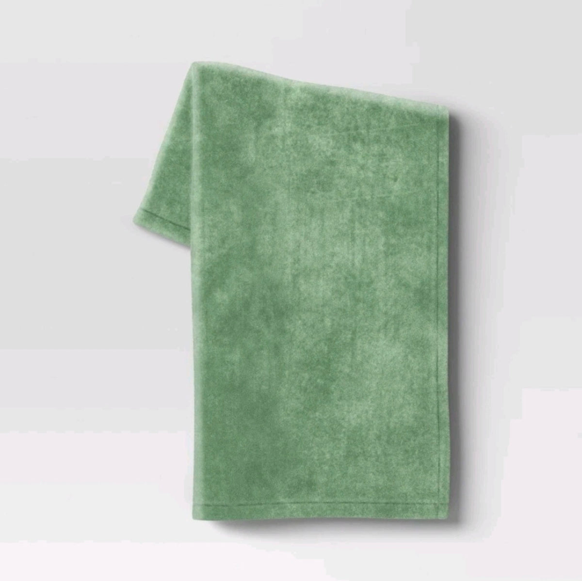Room Essentials green plush throw, 50 by 60 inches; sold as a case of eight